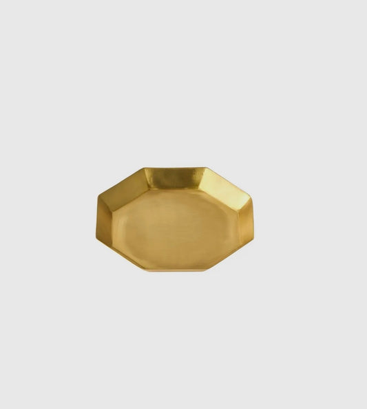 A medium-sized, octagonal, brass tray with a smooth finish.