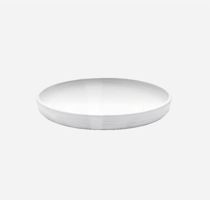 A matte white ceramic tray with a smooth surface and rounded edges on a plain background.