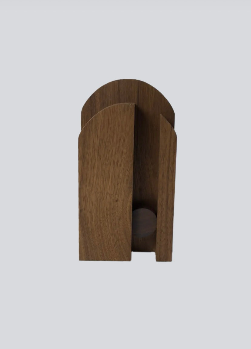 Wooden broom hanger on a light gray background