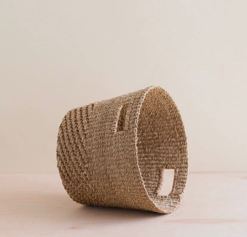 NATURAL TAN TAPERED BASKET on side.