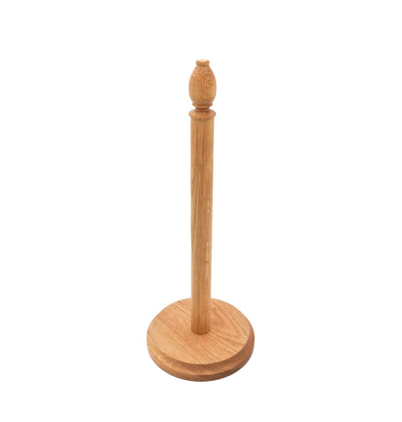 Oak paper towel holder from UK on white background.