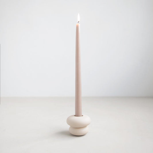 Small white ceramic taper holder.