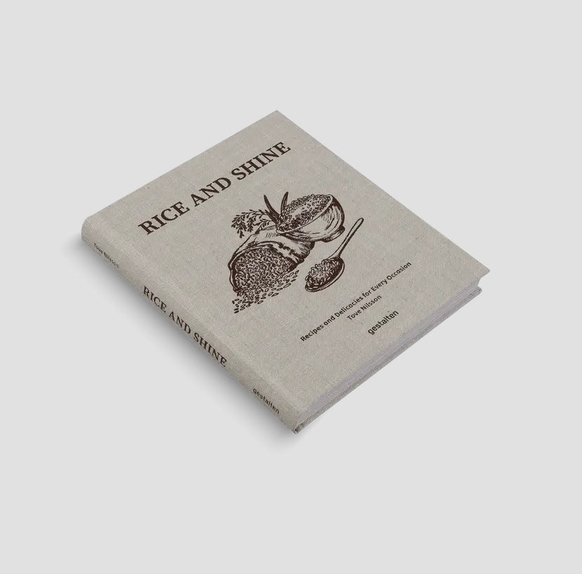 Book titled 'Rice and Shine' on a light gray background