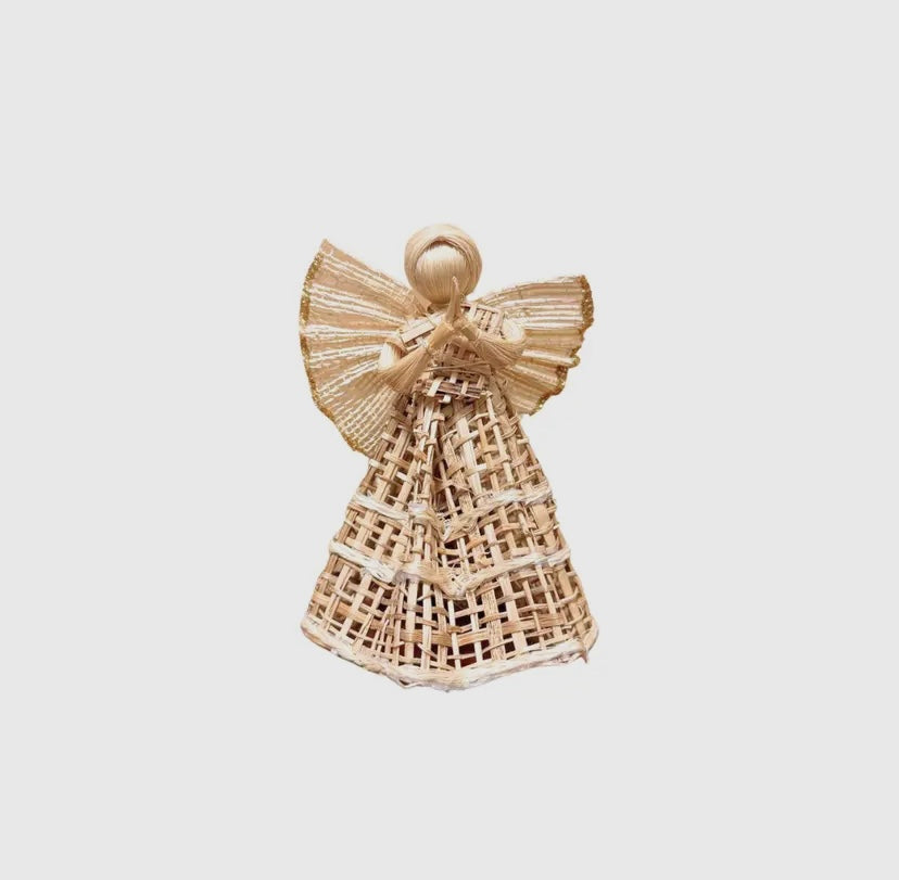 Woven angel decoration on a light gray background