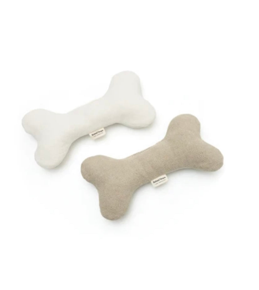 Hemp dog bone toy in white and tan two tone.