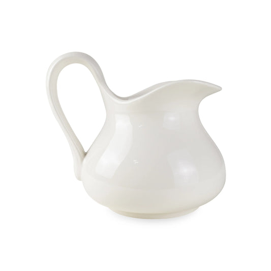 White stoneware pitcher from Sri Lanka on a white background