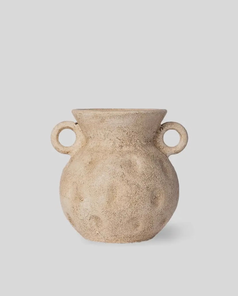 Handmade rustic clay vase with textured imprints