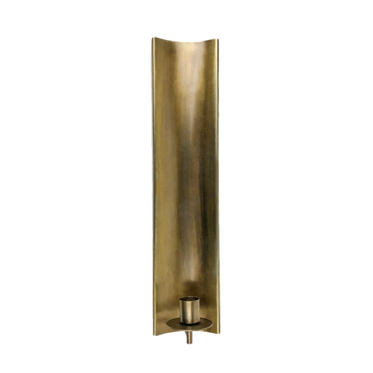 A gold-colored elongated taper sconce made of brass-plated steel sheeting with a candle holder at the bottom