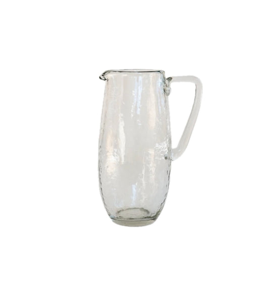 Handblown glass pitcher with pebbled finish.