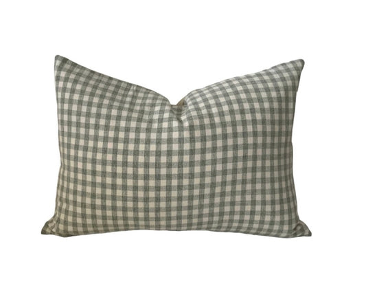 A square-shaped pillow cover with a sage green and ivory check pattern on a white background.