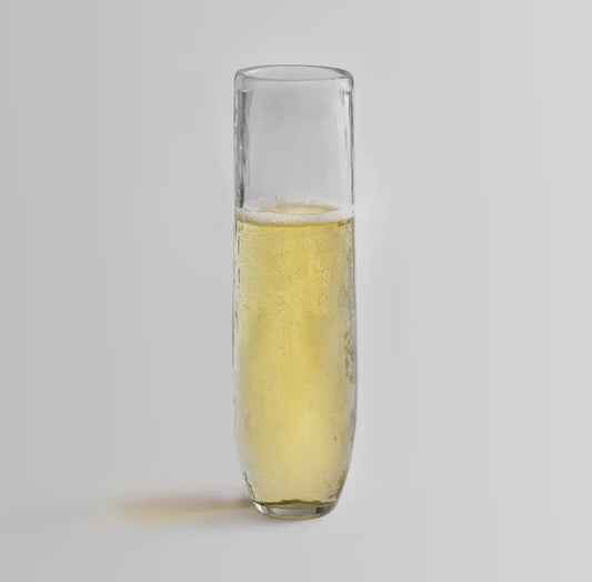 Stemless pebbled glass flute.  Handmade in India.