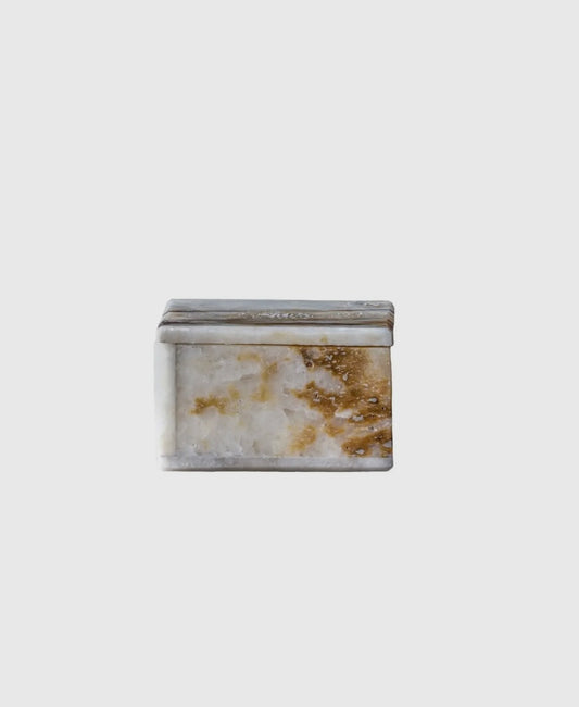 Rectangular marble-patterned box on a white background
