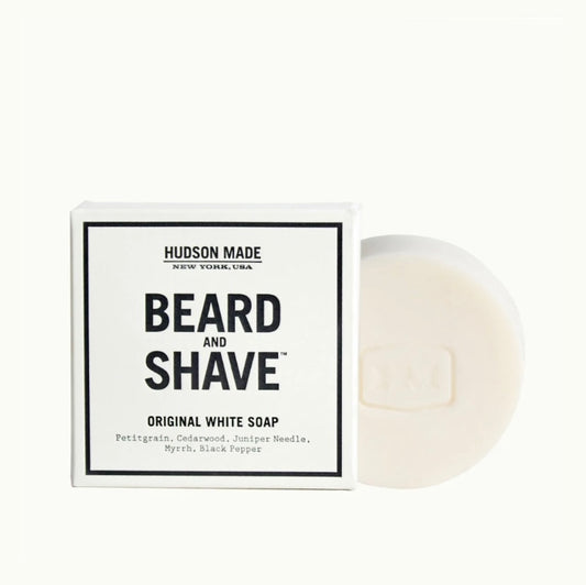 A bar of Hudson Made Original White Beard and Shave Soap next to its packaging box.