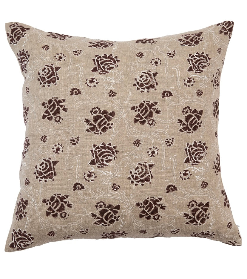 Decorative pillow with turtle pattern on beige background