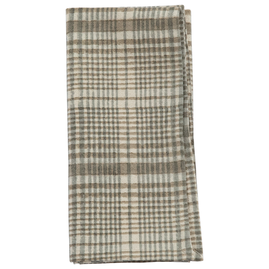 Folded plaid towel with brown and beige pattern on a white background