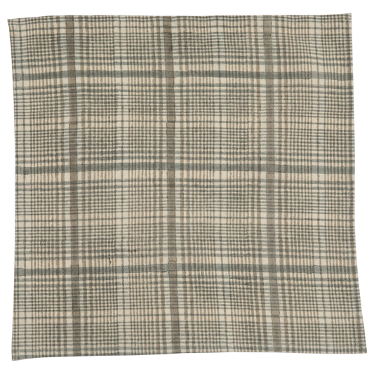 Plaid patterned fabric with a checkered design on a white background