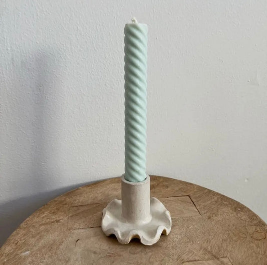 Ruffle Taper Candle Holder with light green candle on table - Handmade Ceramic
