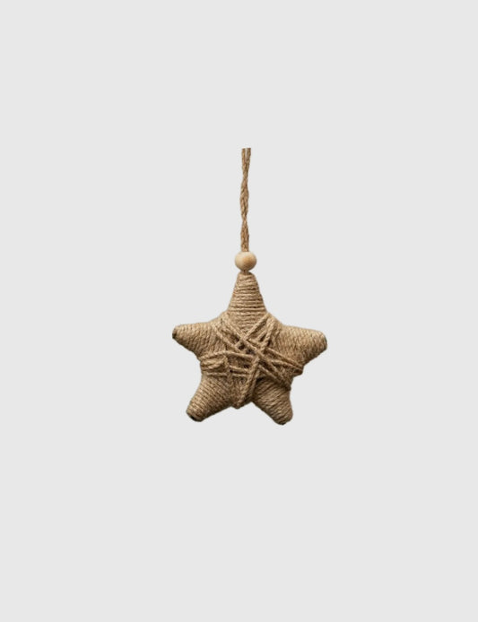 Star-shaped decorative item made of woven material on a white background