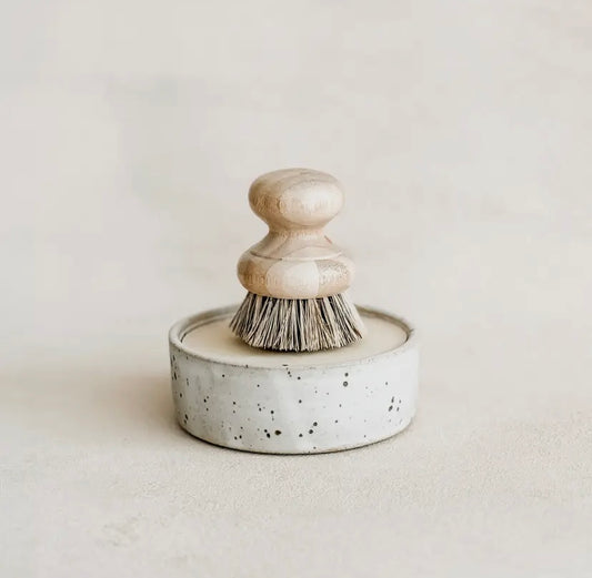 Ceramic dishwashing brush with bristles in a speckled container on a light background. (Brush sold separately)