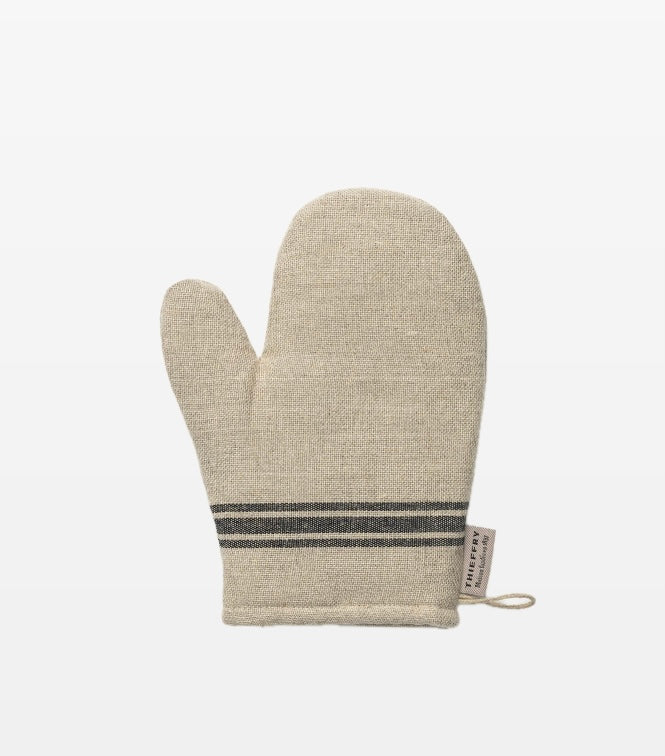 A beige linen oven mitt with black stripes and a loop for hanging.