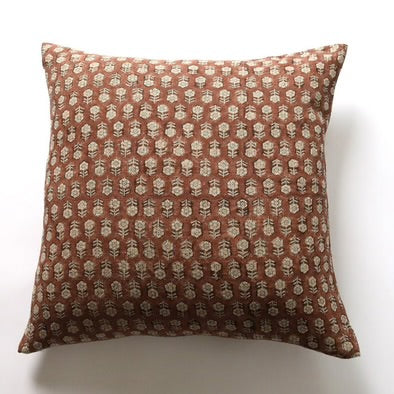Filling Spaces pillow cover with a floral pattern in a brown color, featuring a zipper closure.