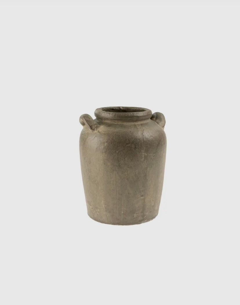 Gray ceramic vase with handles on a white background