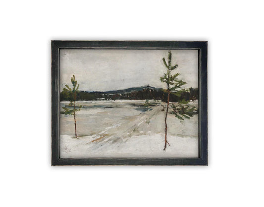 Framed artwork of a snowy landscape with trees on a white background