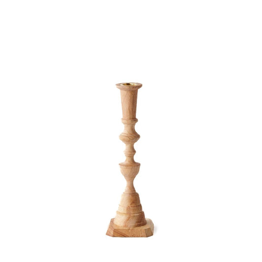 A Georgian-inspired candlestick made of hardwood, with a tall, slender shape and a circular top that holds a candle.