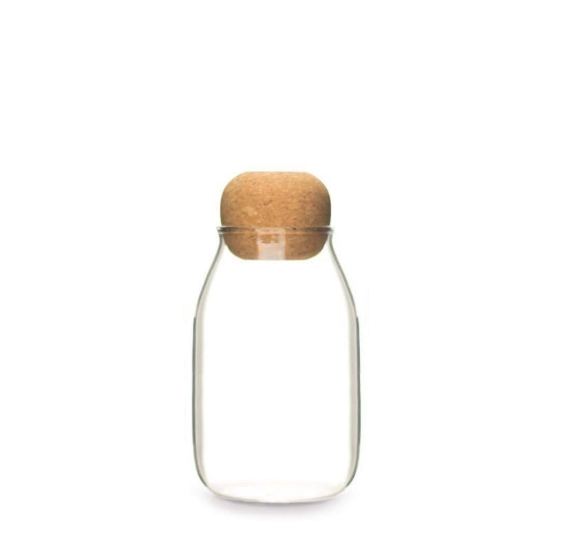 Close-up of minimalist cork-topped jar