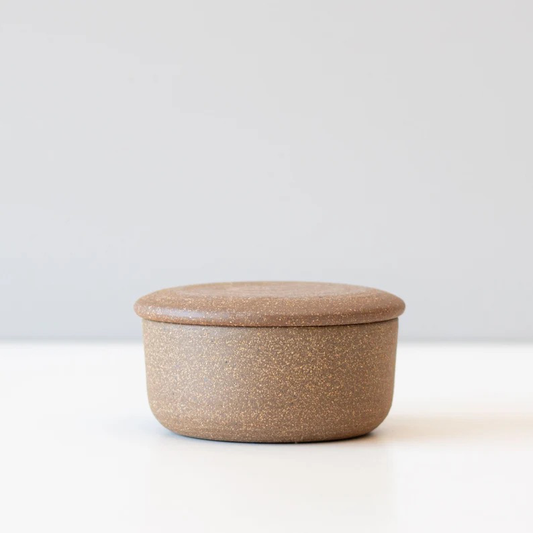 Close-up of USA-made ceramic butter container with rough glaze finish